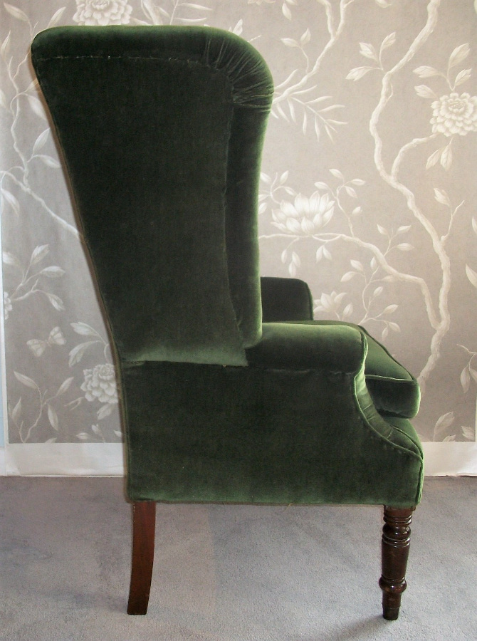 antique wing back armchair